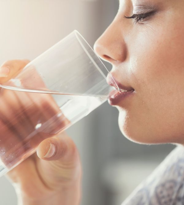woman drinking glass of water