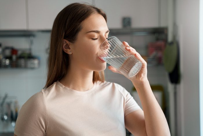 women drinking pure water